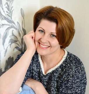 portrait-adult-woman-room-against-wall-53310589